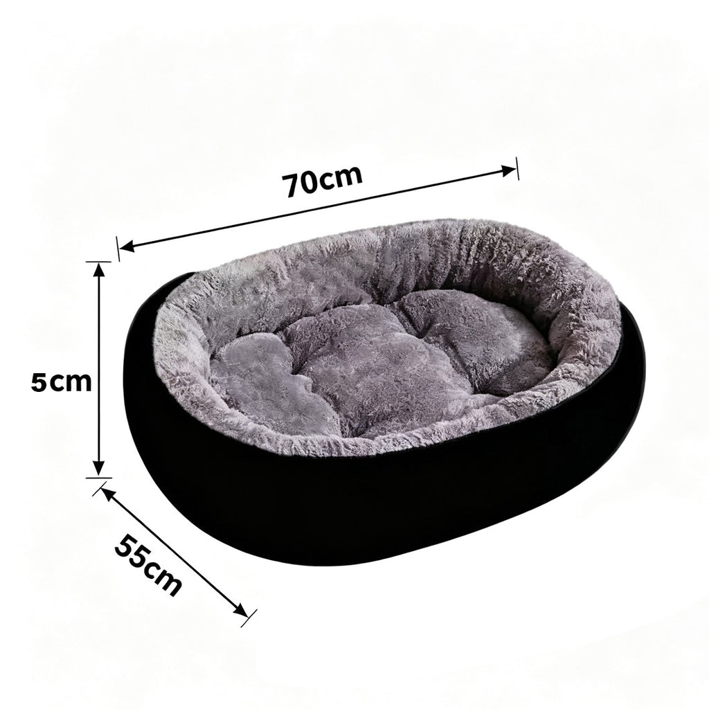 Round black dog bed size diagram labelled 70 x 55 cm and 5 cm
