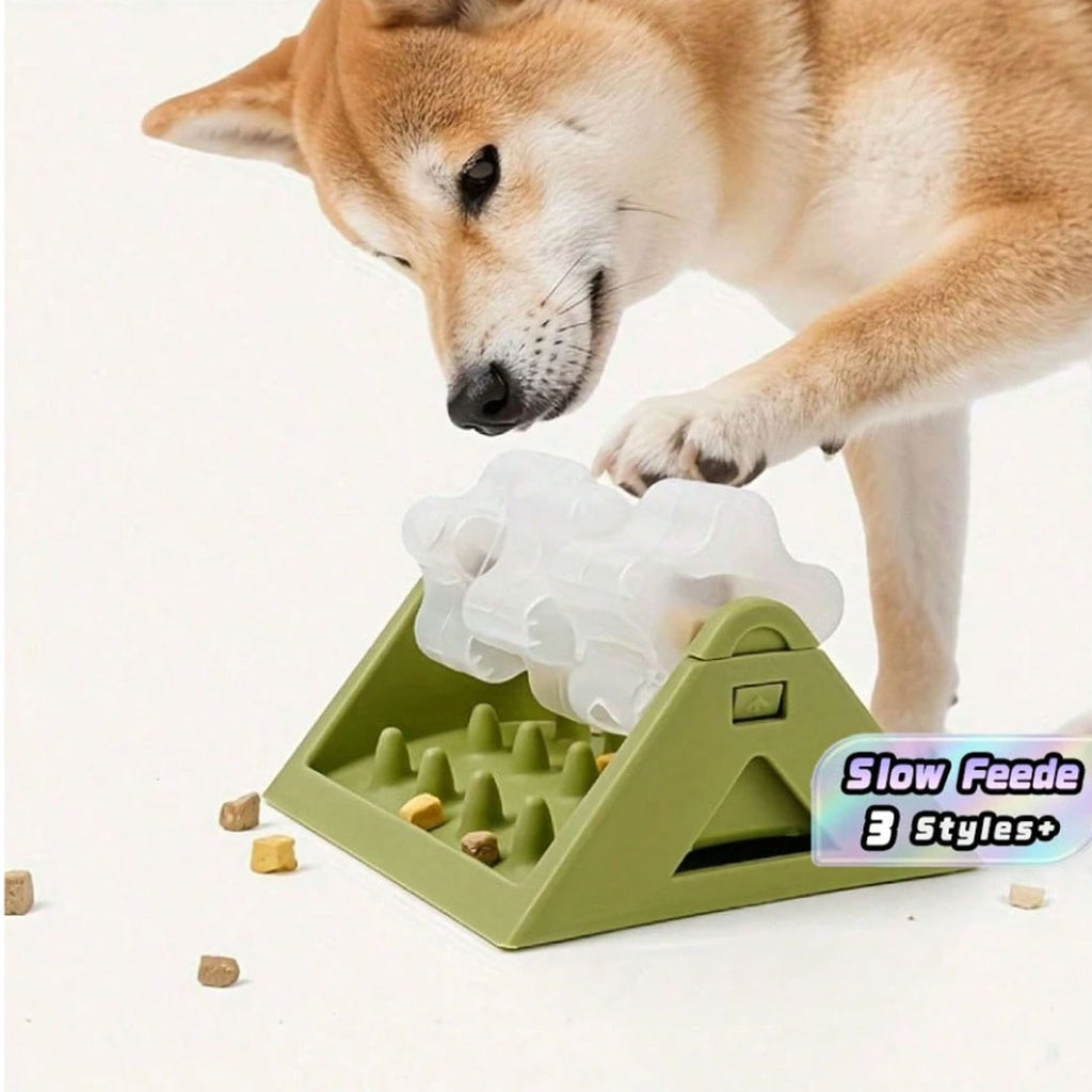 Rotating puzzle slow feeder with a clear roller on a triangular plastic base