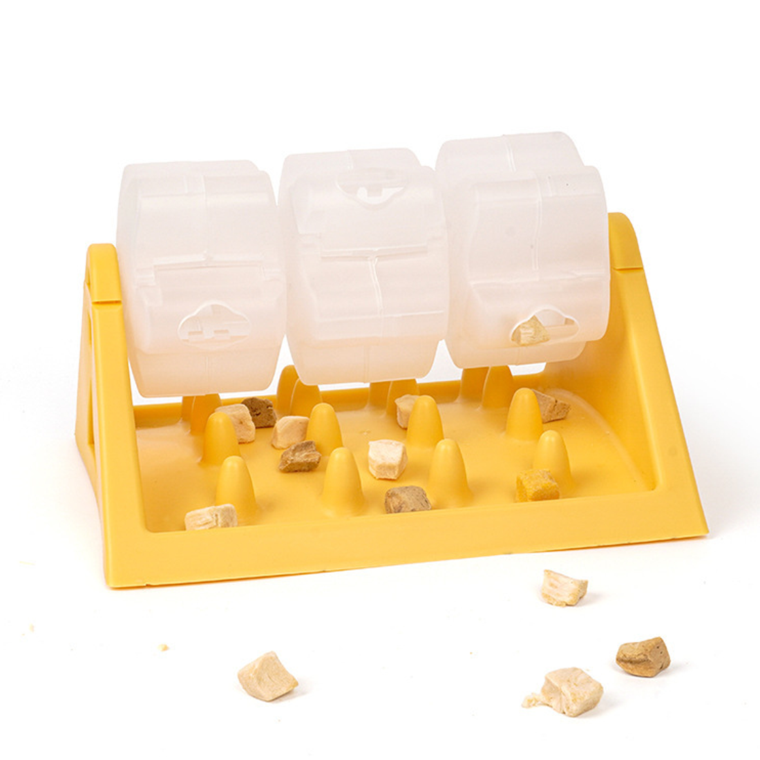 Yellow rotating puzzle slow feeder with a clear roller on a triangular plastic base
