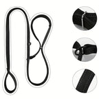 Black lead laid flat on white with close-ups of the metal ring, plastic stopper and edge stitching